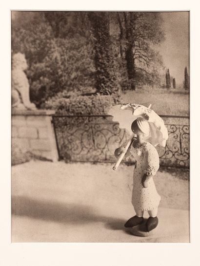 ALBIN-GUILLOT LAURE (1879-1962) Doll with parasol. Original photograph, circa 1945....