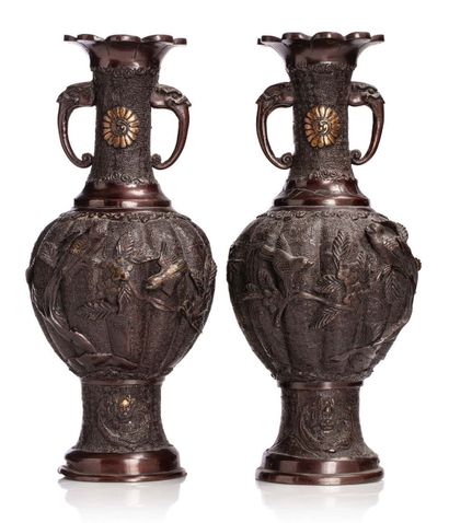 JAPON PÉRIODE MEIJI, VERS 1880-1900 
A pair of bronze baluster vases with a reddish-brown...