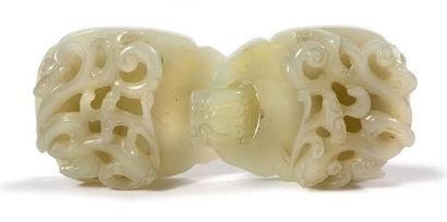 CHINE VERS 1900, FIN DE L'ÉPOQUE QING 
Boucle de ceinture en jade blanc céladonné...