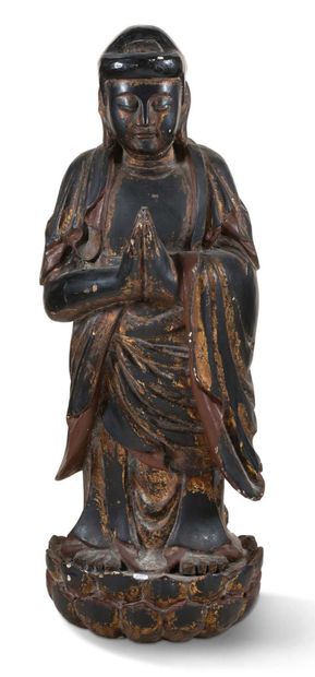 CHINE XXe siècle 
Wooden Buddha standing with hands joined on his lotus. Formerly...