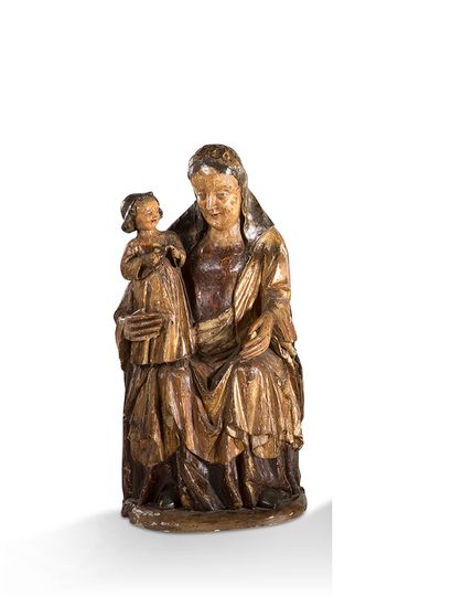 null 
+ VIRGIN WITH CHILD seated in carved and polychromed wood, back hollowed and...