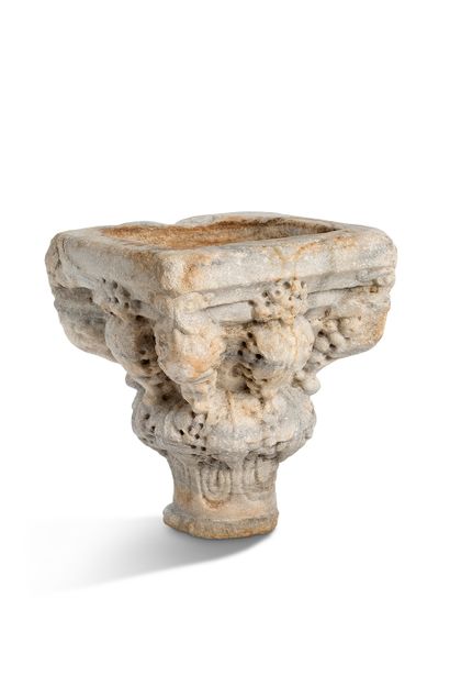 null BENITIER (?) in white marble from Saint-Béat, carved on all sides.

Narrow baluster-shaped...