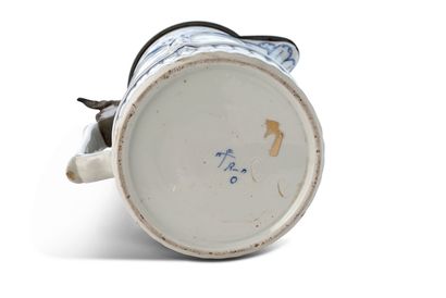 null CHOPE or tankard covered in white porcelain, blue decoration. Pewter frame....