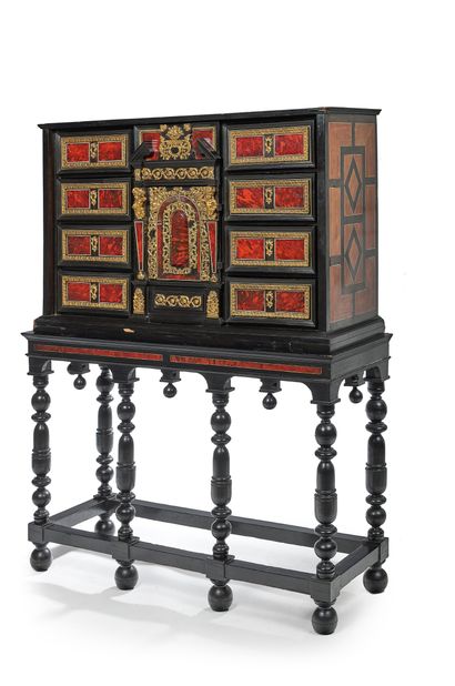  A cabinet with ebony, ivory, tortoise shell and rosewood veneer, gilt bronze trim....