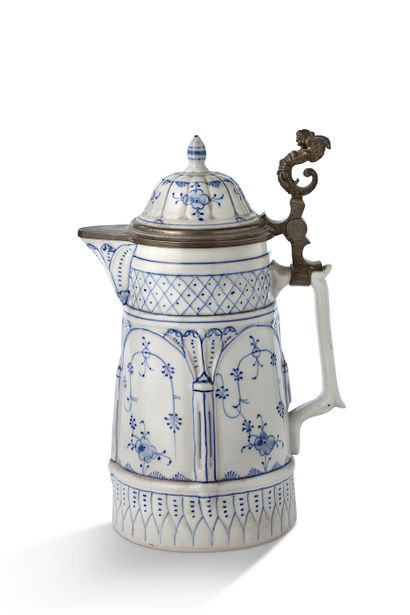 null CHOPE or tankard covered in white porcelain, blue decoration. Pewter frame....