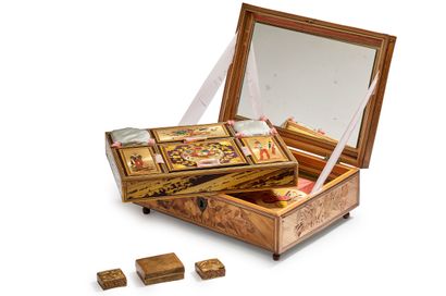 null SMALL COUTURE BOX in straw marquetry of rectangular shape. The lid is decorated...