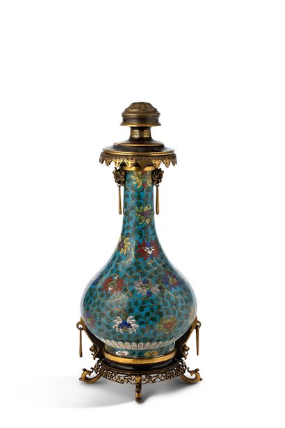 null PAIR OF MOUNTED VASES A pair of baluster-shaped bottle vases in cloisonné enamels...