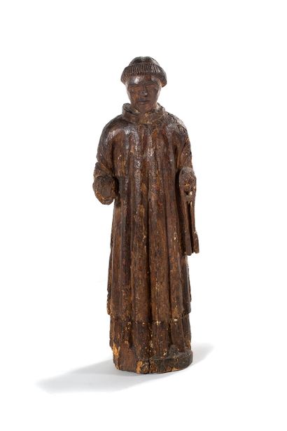 null MOINE in wood carved in the round, formerly polychromed. His head is tonsured...