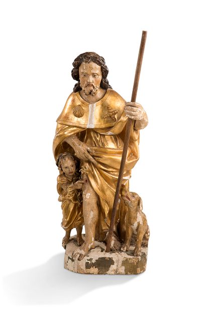  + 雕刻、镀金和多色木制的圣洛奇，粗糙的背面。他穿着朝圣者的斗篷，揭开他的右腿，露出他的泡泡，天使和狗在他身边。...