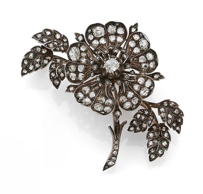 null 
BROCHE « FLEUR TREMBLEUSE »



Diamants taille ancienne, taille rose



Or...