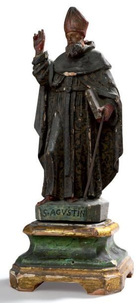 null Statuette en bois sculpté et laqué, figurant Saint Augustin. XVIIIe siècle (éclats)...