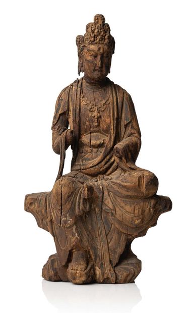 CHINE XXe siècle 
Sujet en bois avec traces de polychromie et dorure représentant...