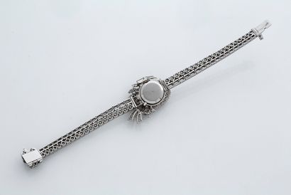 null 
DIAMOND" BRACELET WATCH

Baguette, round and navette diamonds

Round dial,...