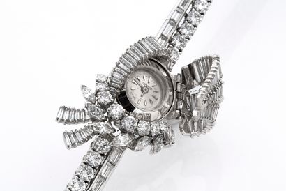 null 
DIAMOND" BRACELET WATCH

Baguette, round and navette diamonds

Round dial,...