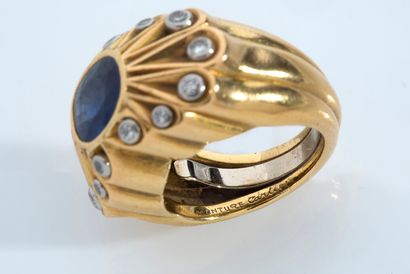 CARTIER 
BAGUE «SAPHIR»

Saphir ovale, diamants, or 18k (750)

Signée «Monture Cartier»...