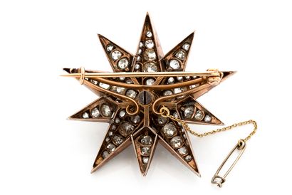 null 
STAR" BROOCH 

Old cut diamonds and roses

18k gold (750) and silver (<800)

19th...