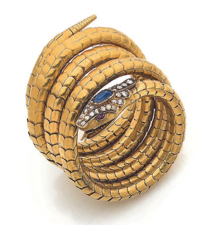 null 
蛇 "手镯

蓝宝石，玫瑰式切割钻石，18K（750）金

法国作品 - 19世纪末

Pb.69.8克



蓝宝石、钻石和黄金手镯
