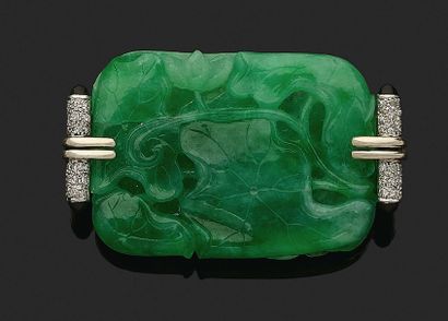 SUZANNE BELPERRON 
BROOCH "JADE JADEITE ENGRAVED WITH WATER LILIES

Round diamonds,...