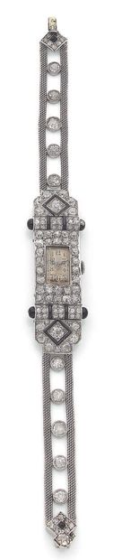 null 
女士腕表 "Joaillerie

老式切割钻石，黑色珐琅

铂金（950）和18K金（750）。

法国作品，约1920年

L. : 16 cm...