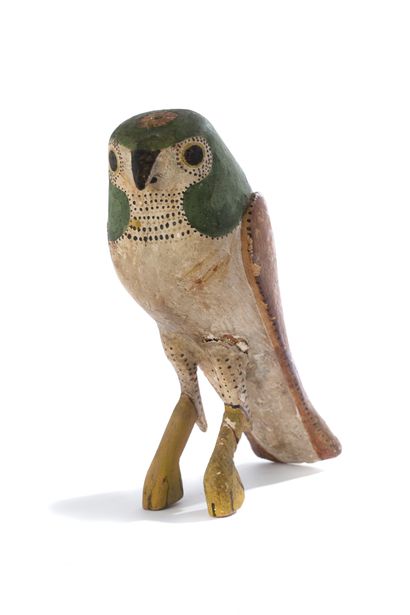 null HORUS FAUCON AKHEM in carved and stuccoed wood painted polychrome. The head...