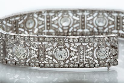 VAN CLEEF & ARPELS BRACELET « RUBAN »
Diamants ronds, platine (950)
Signé et numéroté
L....