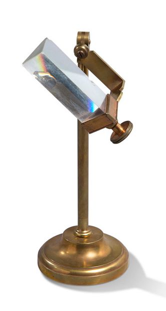 Newton's Prism In brass and glass on a stand...