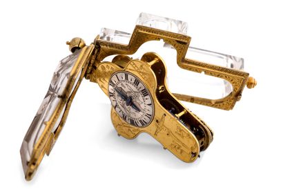 BERGIER, Paris 
Watch in gilded metal and rock crystal, spiral pre-balance, cross-shaped



Hinged...