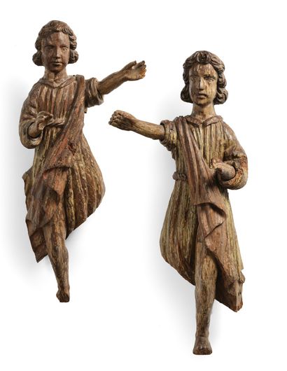 TWO ANGELS in carved wood with traces of...