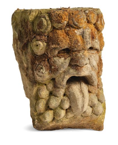 null MODILLON DE FONTAINE en pierre sculptée représentant un visage d'homme aux cheveux...