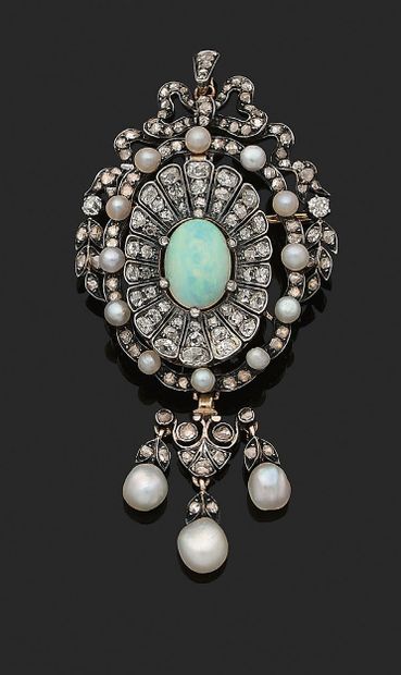 null 
OPAL BROOCH-PENDANT

Opal, pearls, old and pink diamonds

18k gold (750) and...
