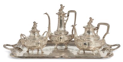 null TEA & COFFEE SET composed of a coffee pot, a teapot and a sugar bowl in silver...