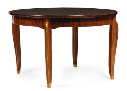 ATTRIBUÉ À JULES LELEU (1883-1961) Table de salle à manger circulaire à quatre pieds...