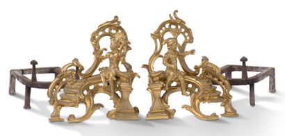null PAIR OF CHENETS " AUX MARMOUSETS " in chased and gilded bronze decorated with...