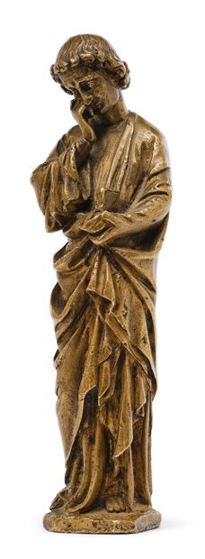 null 圣约翰
一尊青铜像，站在十字架脚下哭泣，仿佛在哭泣。他左手拿着他的福音书的属性，右手擦干他的眼泪。13世纪下半叶的风格。
高度：21厘米 - 宽度：4...