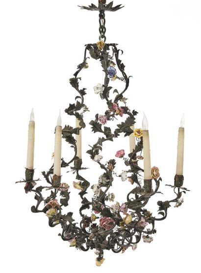 null Painted sheet metal chandelier of scrolled and foliated form, decorated with...