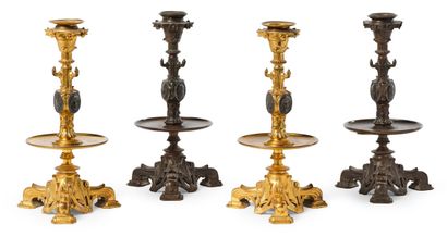 HENRI CAILLEUX (1854 - 1925) Suite de quatre flambeaux formant baguiers en bronze...