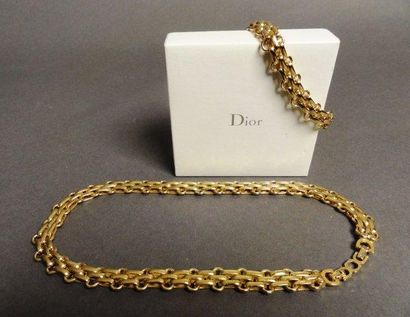 CHRISTIAN DIOR Parure en métal doré comprenant le collier et le bracelet à maille...