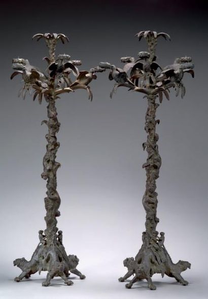 FRATIN Rare paire de candélabres, à sept lumières, en bronze finement ciselé et patiné....