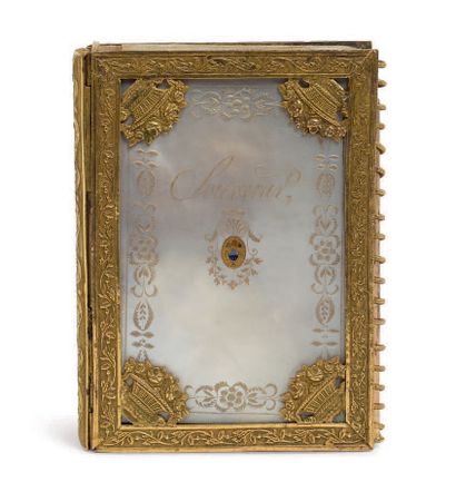 null SMALL MEMORANDUM NOTEBOOK the mother-of-pearl binding engraved with floral motifs...
