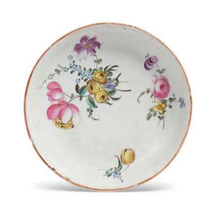 MARSEILLE (?) Small white earthenware saucer decorated with a bouquet of flowers....