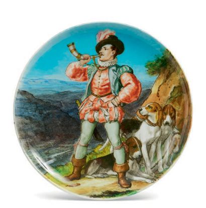 THÉODORE DECK (1823 - 1891) 圆盘上有多色装饰，满是文艺复兴时期的猎人在敲打橄榄枝，四只狗在他脚下。背面标有：TH.红色的DECK。
直径:...