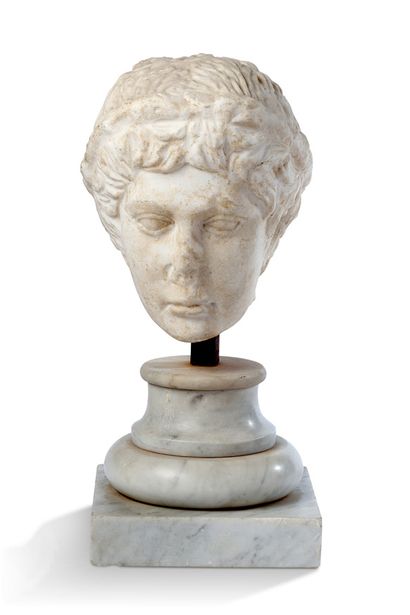 null ATHLETE'S HEAD sculpted in white marble, the youthful and elongated face, presents...