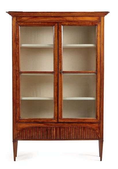 null ARGENTIER or bookcase opening with two glazed leaves in the upper part. A wide...