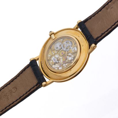 BREGUET BREGUET
No. 1745
Skeleton wristwatch in 18k (750) yellow gold. Round case,...