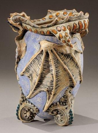 AMPHORA, attribu Vase à corps ovoïde reposant sur un piétement en enroulement en...