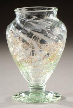EMILE GALLE (1846-1904) Rare vase en verre soufflé translucide légèrement teinté...