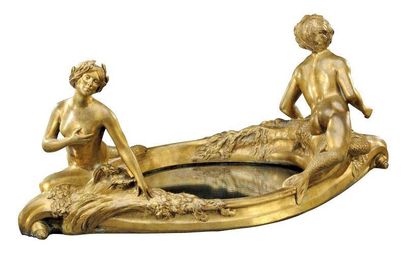 EUGENE LEON L'HOEST (1874-1937) Centre de table en bronze à patine dorée encerclant...