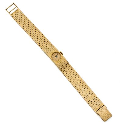 ANONYME ANONYME
Vers 1960
Montre bracelet de dame en or jaune 18k (750)
Boîtier :...