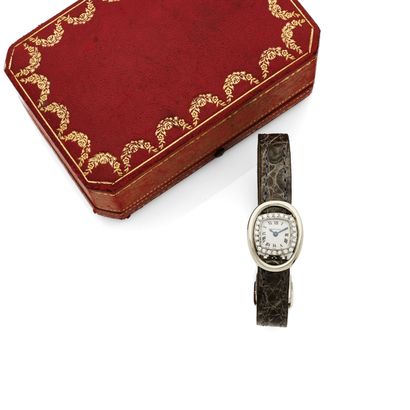 CARTIER CARTIER
No. 1048084
Vers 1960
Montre bracelet en or blanc 18k (750)
Boîtier...