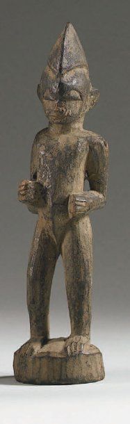 null SÉNOUFO. ( Mali / Côte-d'Ivoire) Bois. h. : 17 cm Statuette masculine à coiffure...